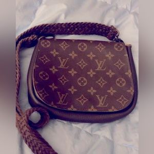 This Crossbody was made from leather from another handbag.